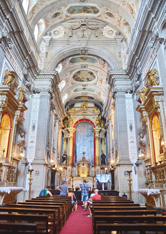 24 - The ornate interior of the Church of Saint Francis in Porto, Portugal, a historic national monument renowned for its spectacular 18th-century gilded woodcarvings